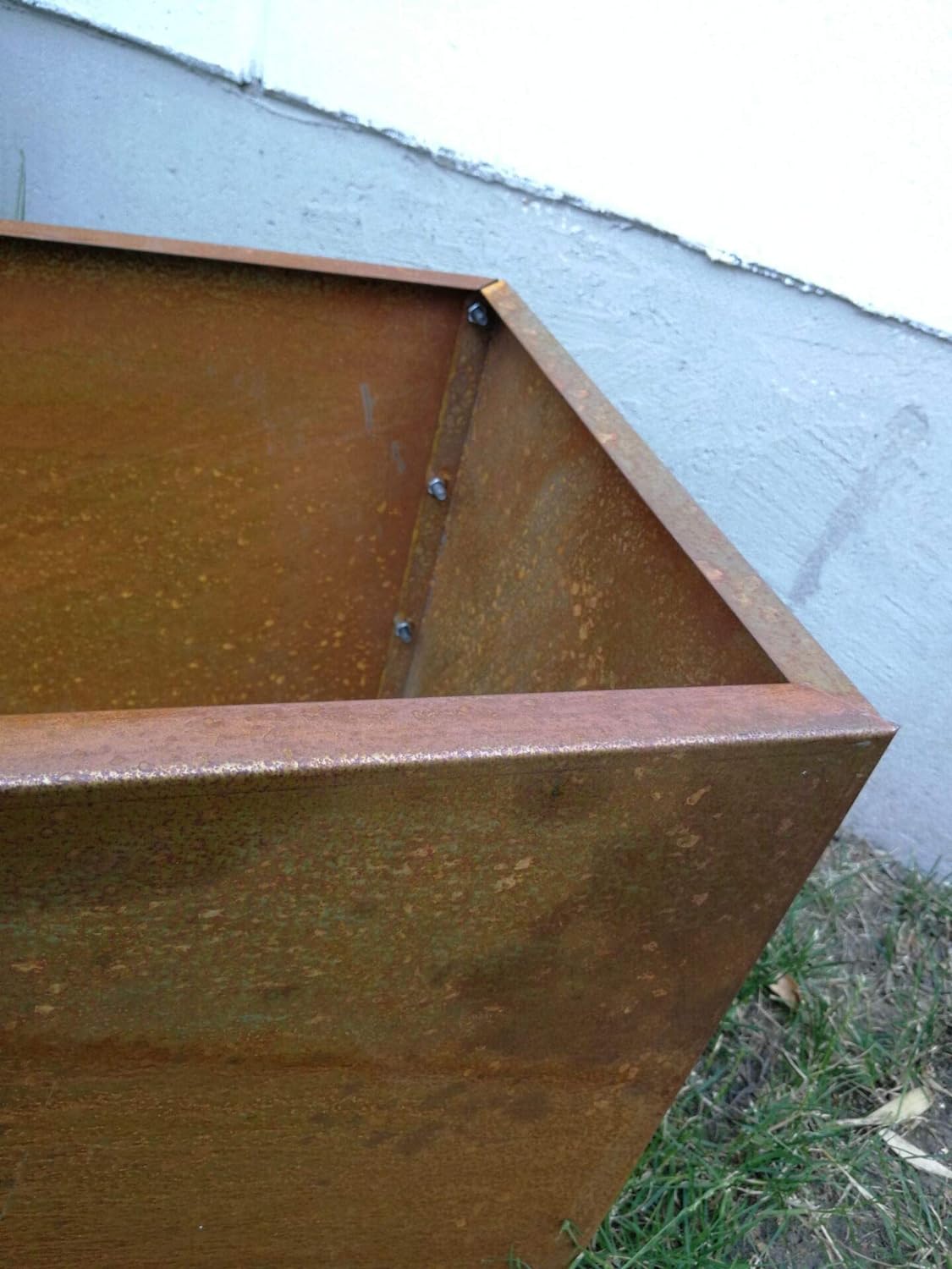 Stylish rust-finished flower box planter made of sheet steel