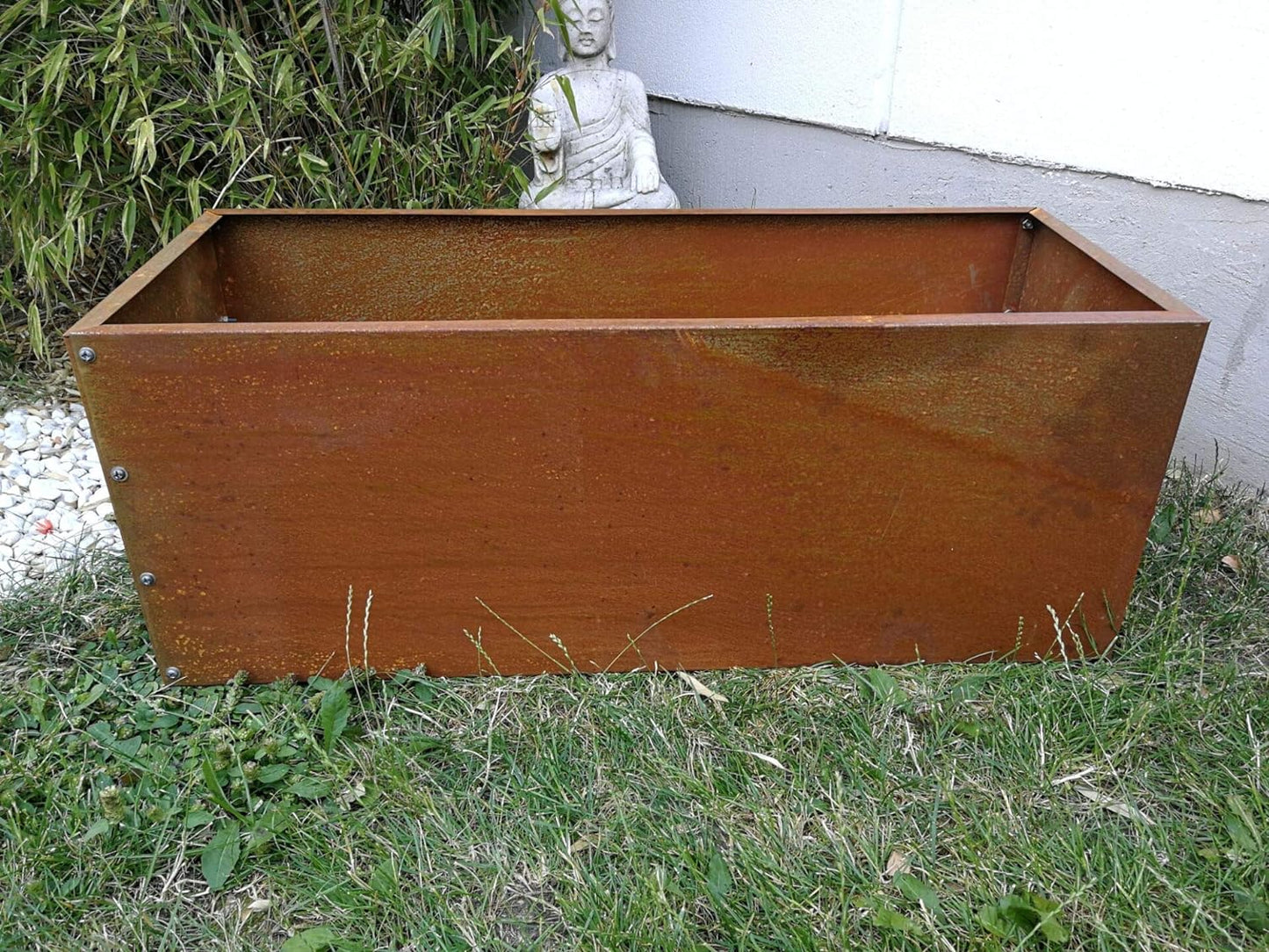 Stylish rust-finished flower box planter made of sheet steel