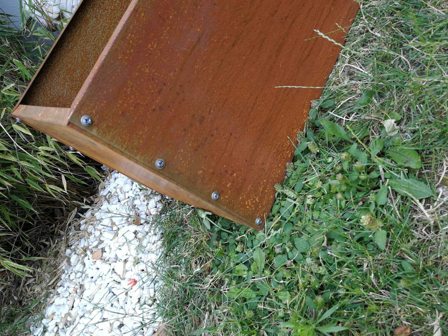 Stylish rust-finished flower box planter made of sheet steel