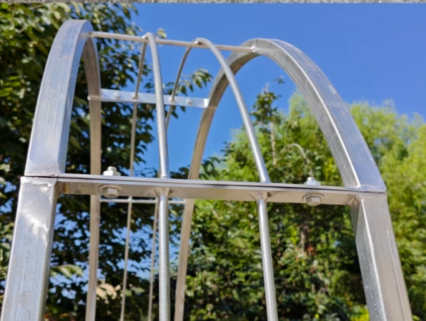 Zen Man Garden rose arch made of galvanized metal