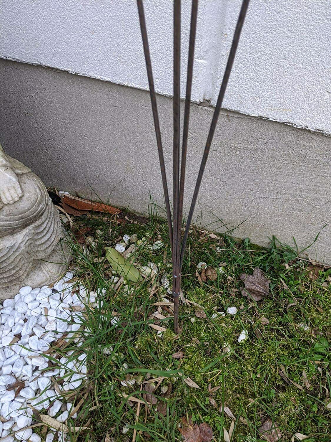 Elegant metal garden stake with artistic glass decoration