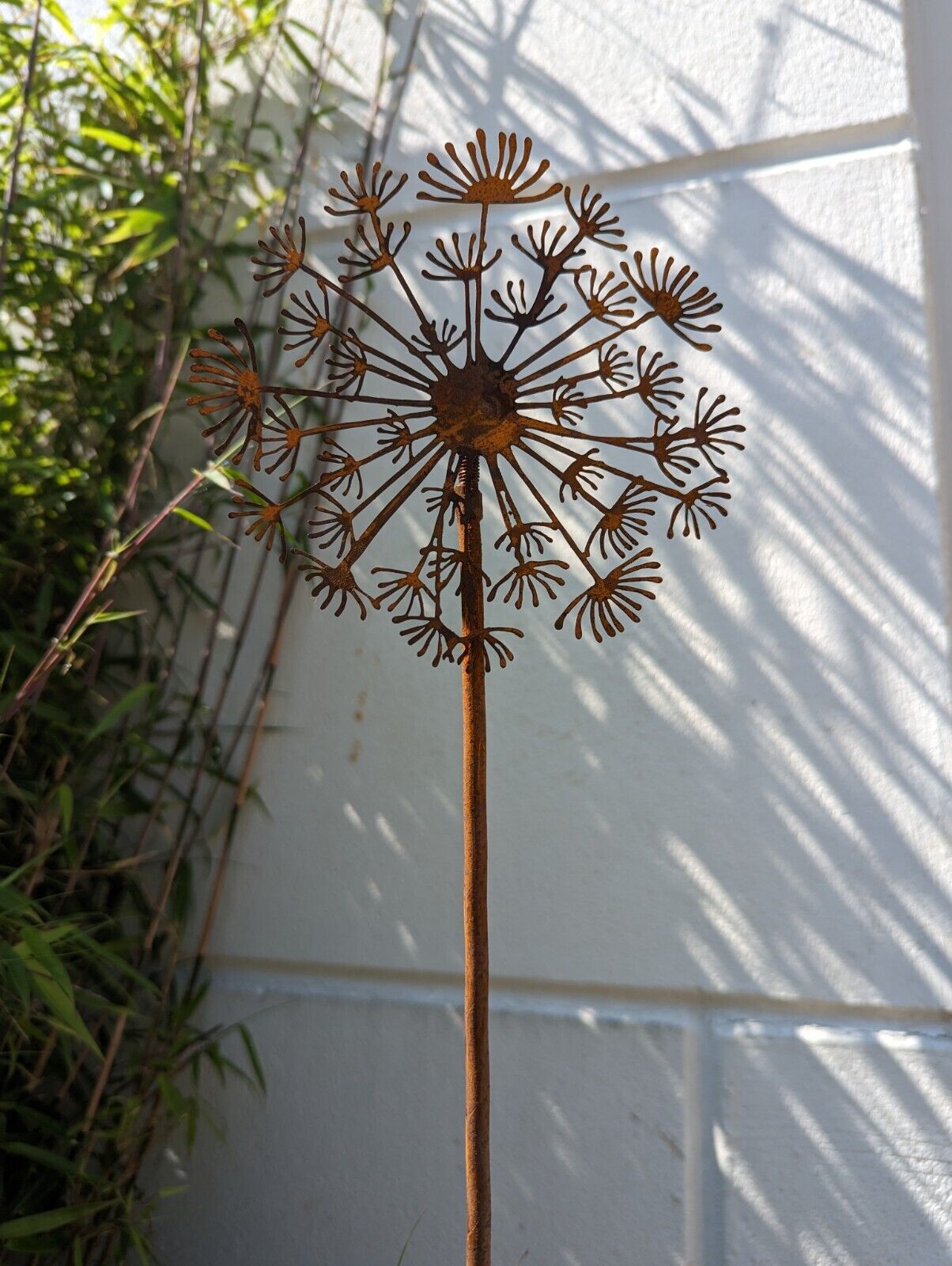 Rust garden stake dandelion dandelion clock